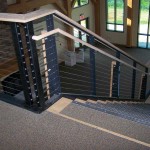 indoor stairs with protective metal cable railing