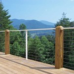 deck with steel cable railing overlooking trees