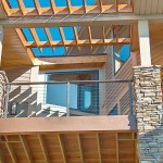 outdoor wood deck with metal cable railing